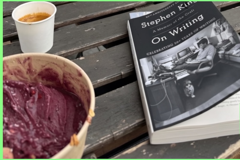 Acai bowl and coffee next to Stephen King's On Writing