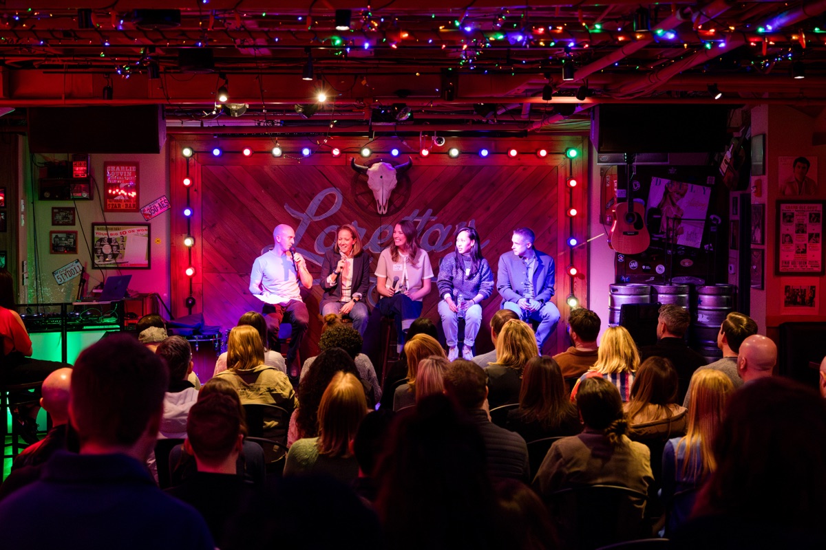 A panel of marketing leaders on stage at a past Exit Five meetup.