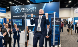 Man doing pull ups as part of a promotion at a B2B marketing event booth
