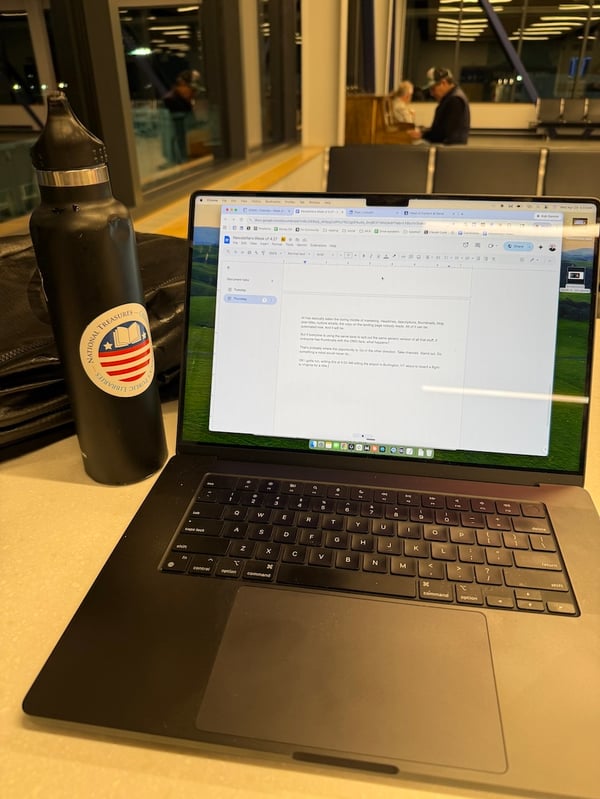 Proof of human - laptop at airport