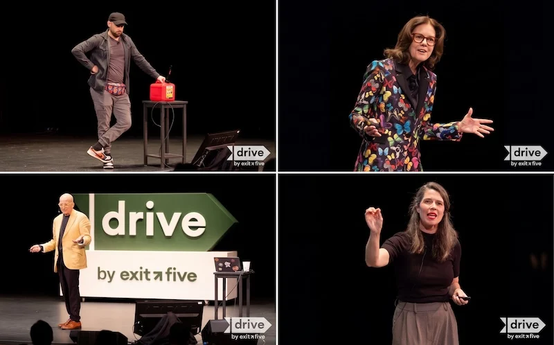 Four speakers presenting on stage