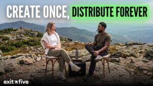 Dasha Shakov and Ross Simmonds seated outdoors on a mountain for an Exit Five interview, with text overlay reading Create Once, Distribute Forever